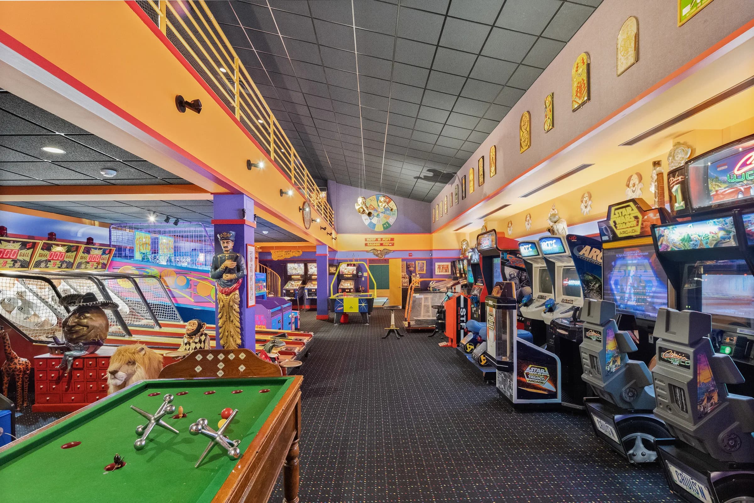 The midway of game cabinets in the arcade