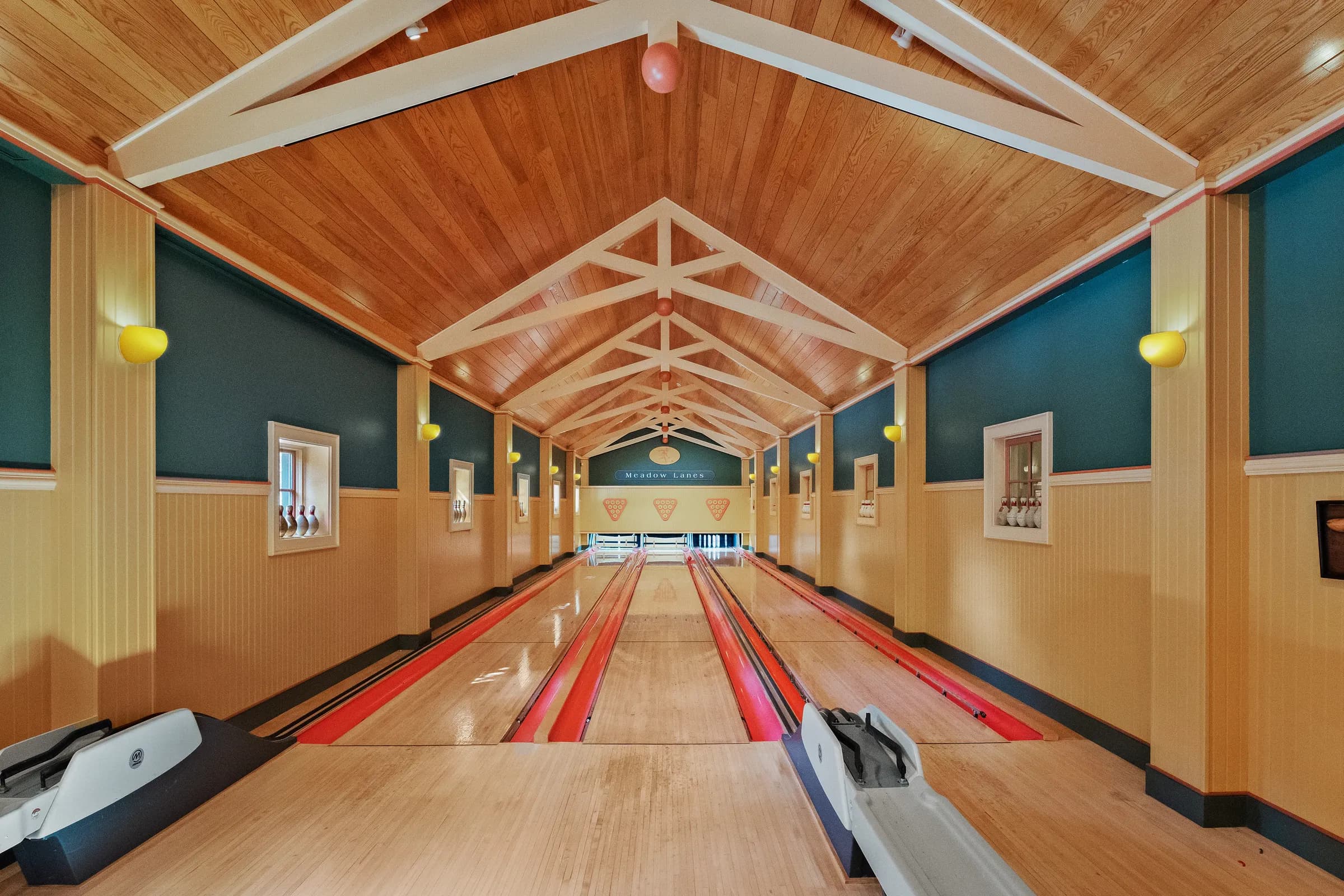The three-lane private bowling alley at Juggler Meadow, set up for a group celebration tournament