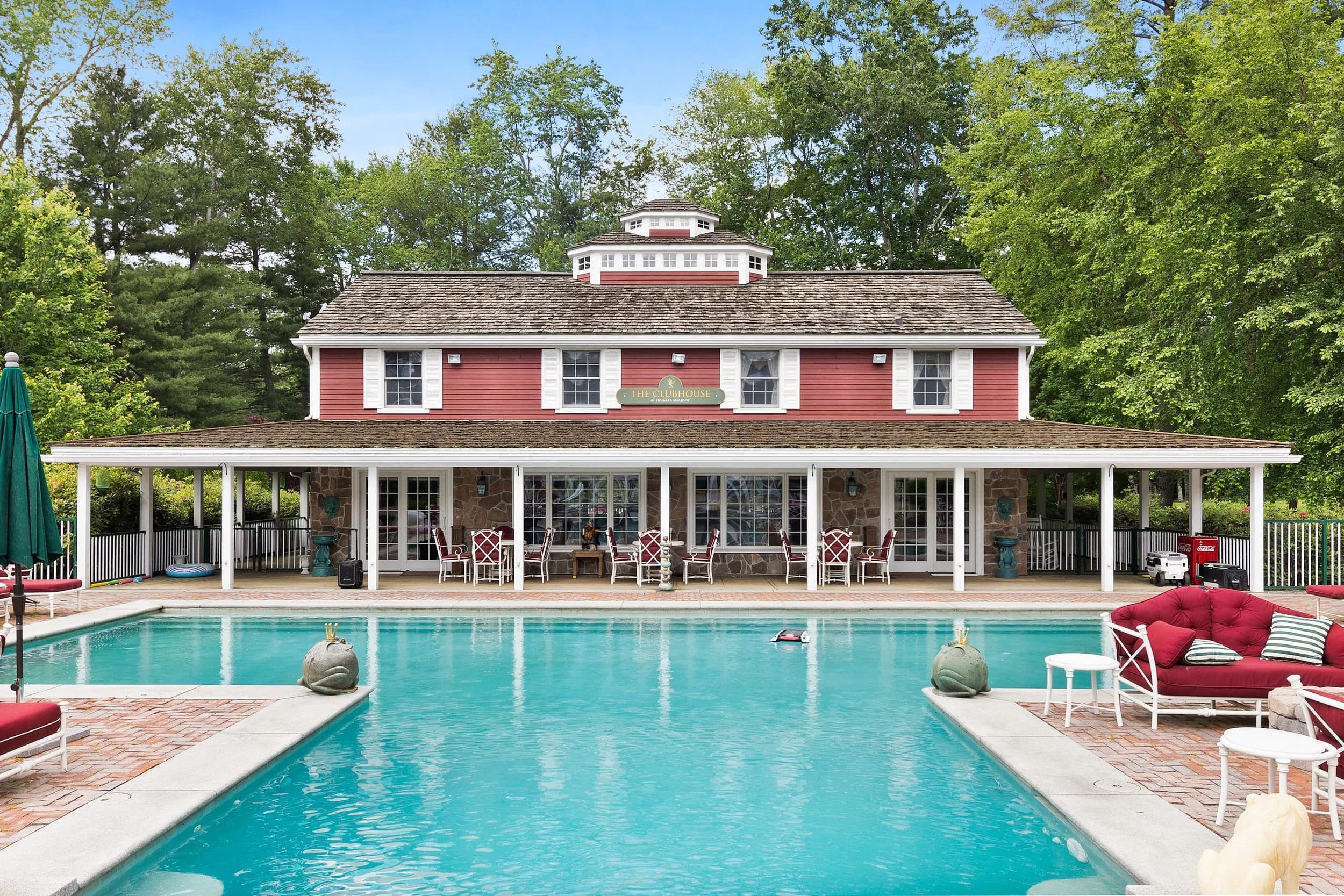 The Clubhouse reflected across the outdoor pool