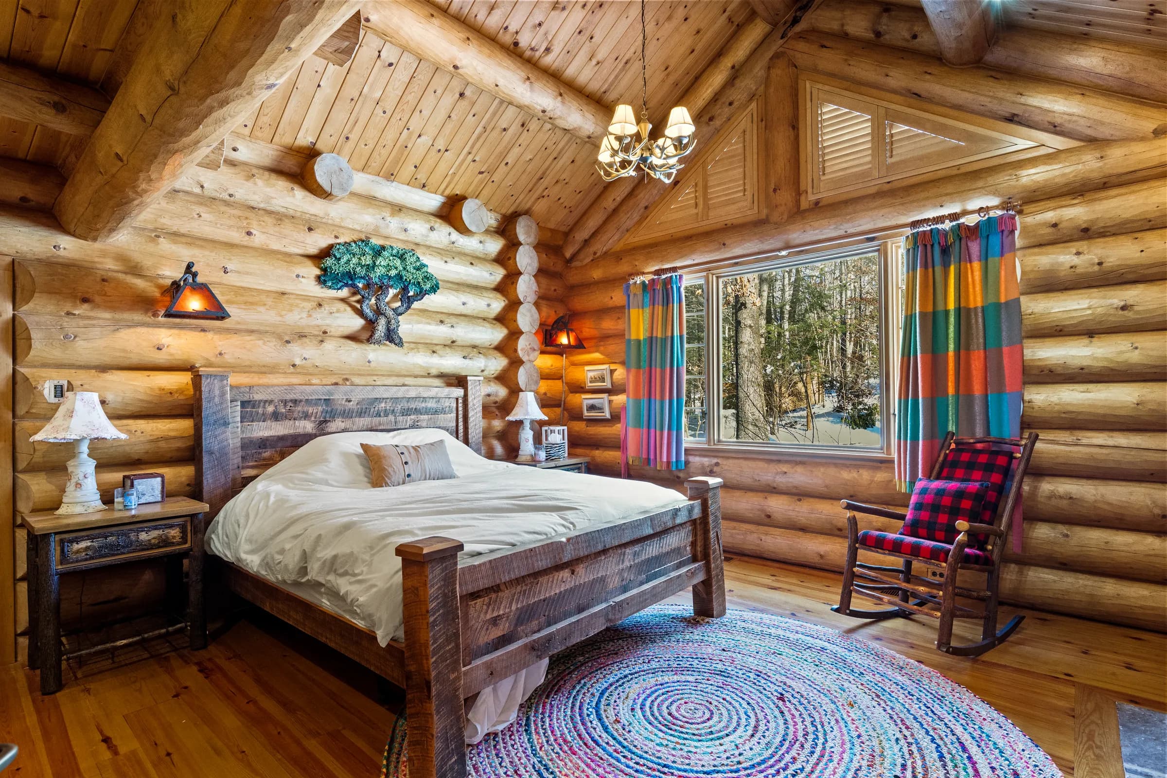 A rustic king bedroom suite in The Lodge
