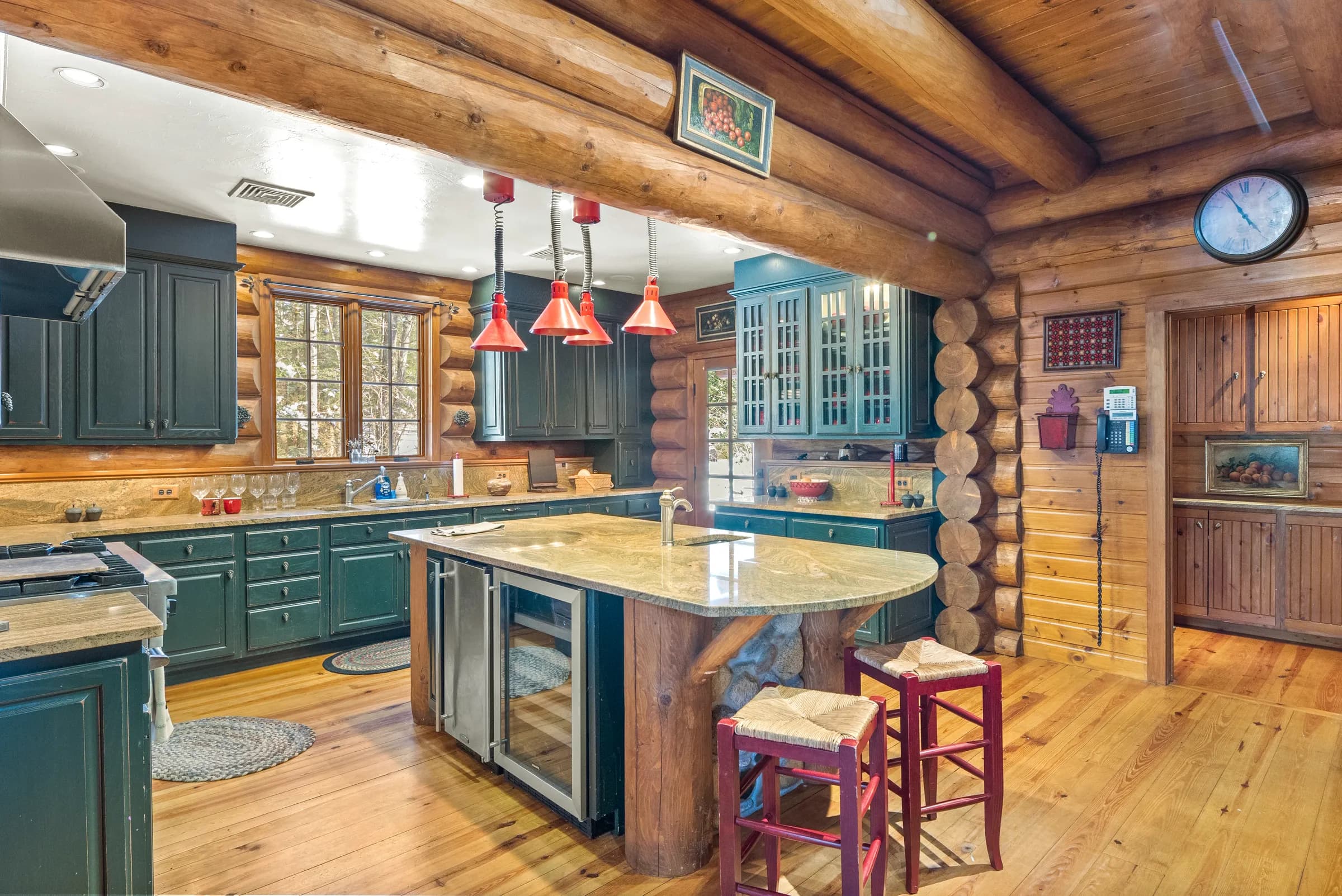 The forest-green kitchen in The Lodge