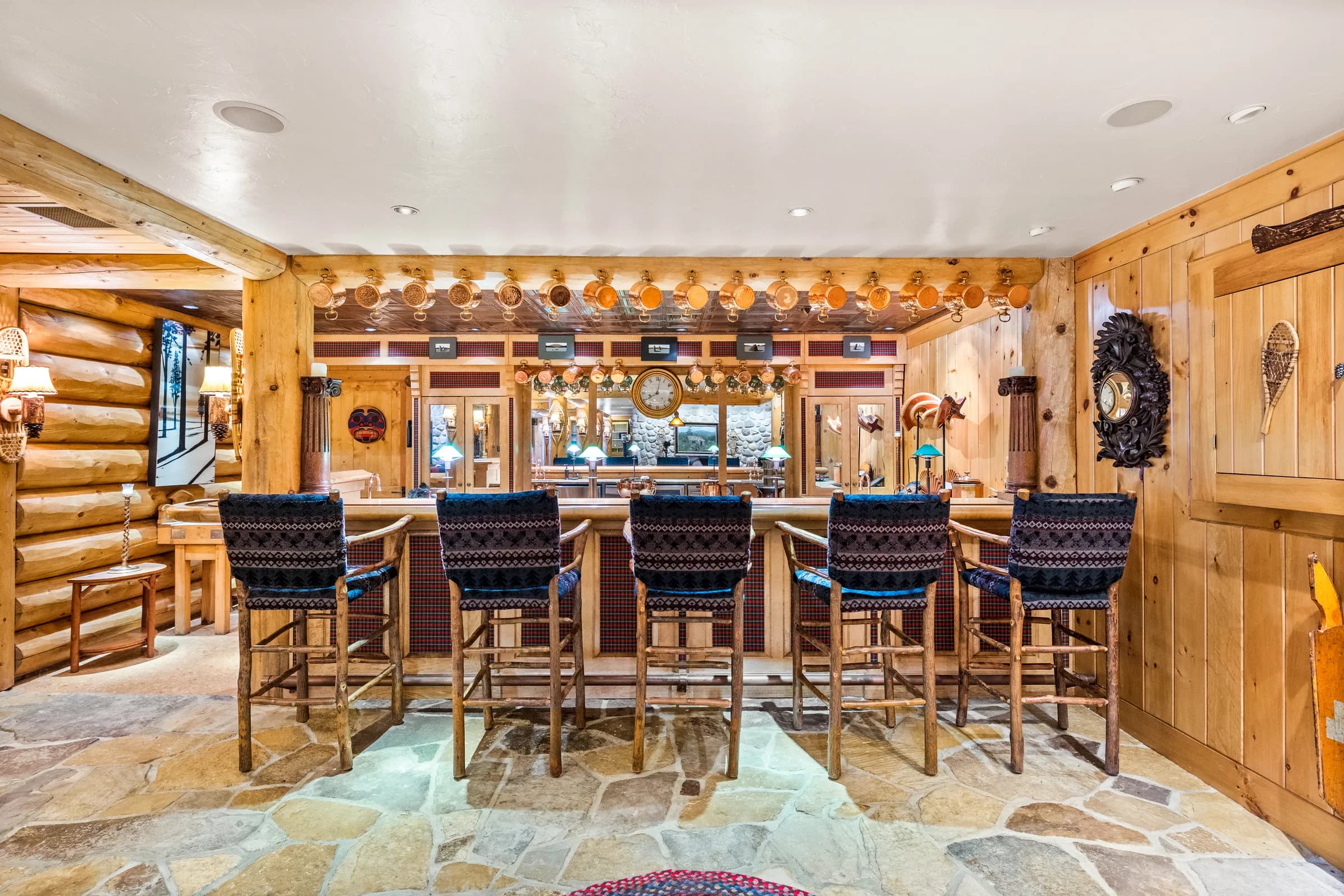 Stools at the private pub bar in The Lodge