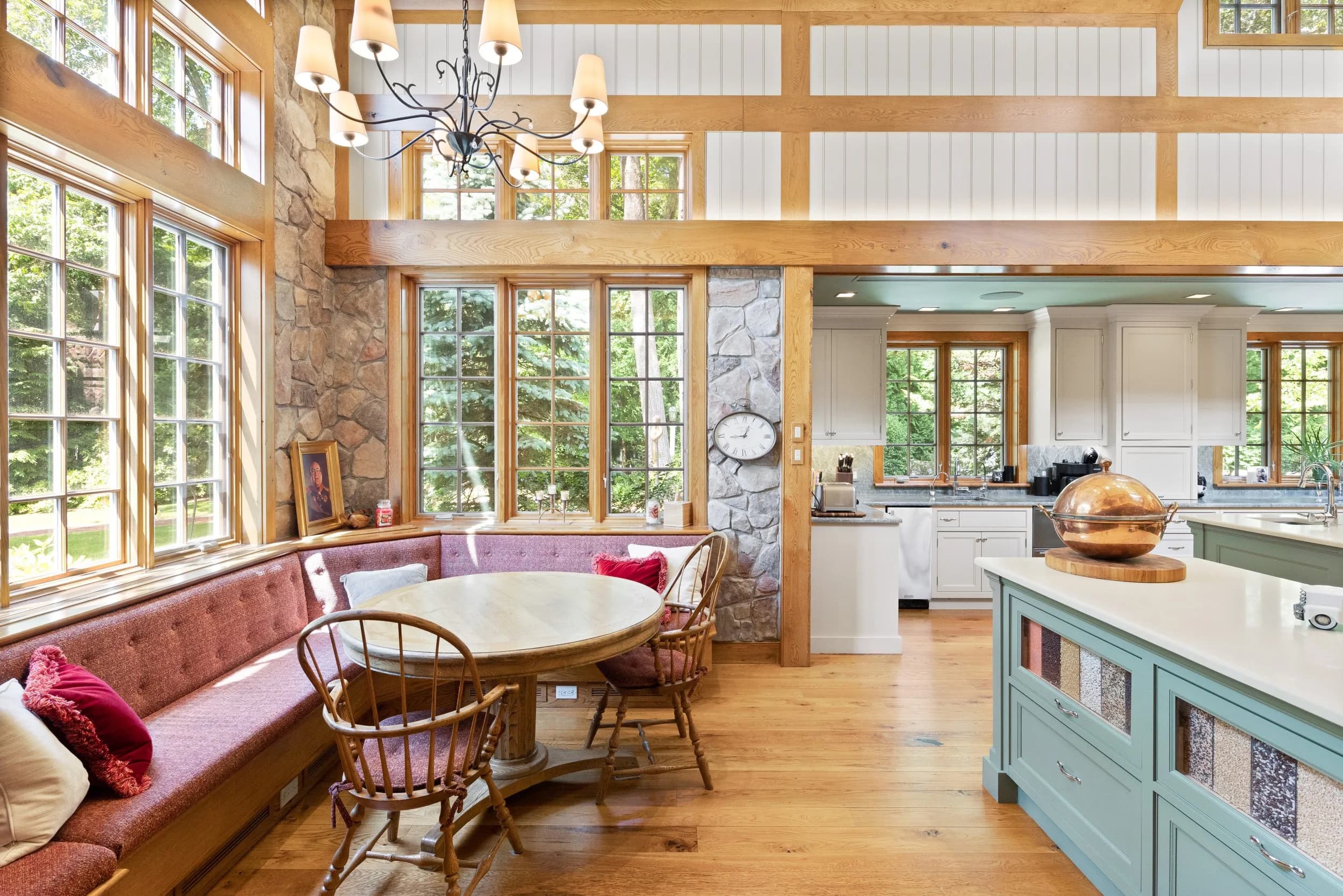The Main House kitchen with five islands beneath a cathedral ceiling