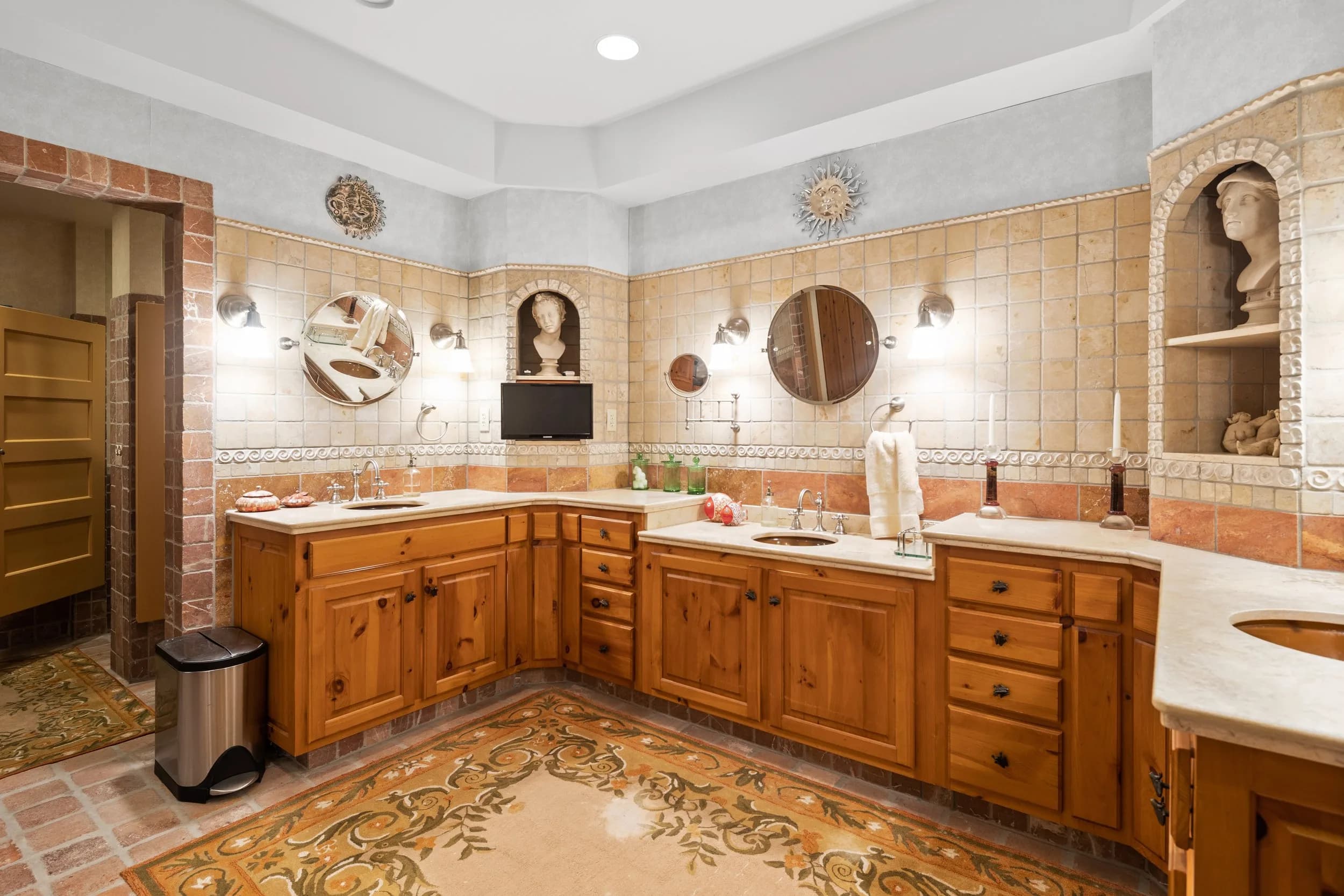 The marble primary bath in the Main House